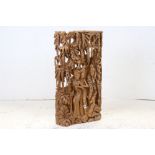 Thai Hardwood Panel profusely carved with figures and animals, 70cms x 39cms