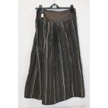 A late 19th/20th century skirt with striped decoration.