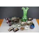 A collection of mixed glassware to include paperweights, vases and carnival glass.