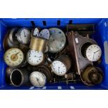 A collection of antique and vintage clock movements.