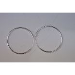 Pair of silver hoop earrings