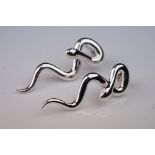 Pair of silver snake earrings