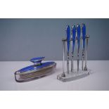 A fully hallmarked sterling silver and blue enamel manicure set marked for Asprey's London and a