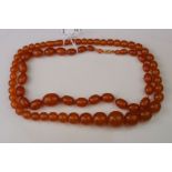 Two Art Deco Amber bakelite beaded necklaces