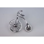 Unusual silver penny farthing bicycle