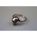 Silver skull ring, with ruby eyes