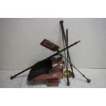 A antique copper coal scuttle together with a quantity of fireside tools.