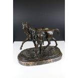 In the manner of Pierre Jules Mene, Bronze of a Standing Jockey and Race Horse, signed to base P T