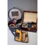 A collection of mainly vintage costume jewellery contained within two boxes to include necklaces,