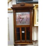 A vintage oak cased wall clock.