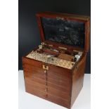 19th century Mahogany Dentist's Cabinet, the hinged top opening to a fitted interior with apothecary