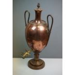 An antique copper Samovar with brass fittings, stands approx 54cm in height.