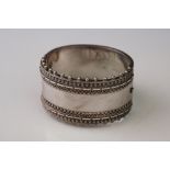 A fully hallmarked sterling silver Edwardian cuff bangle.