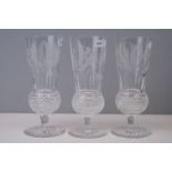 A set of three crystal cut fluted glasses with Thistle etched decoration.