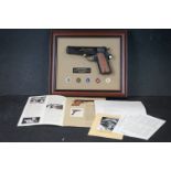 A Franklin Mint John Wayne commemorative .45 numbered collectable pistol, Complete with