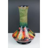 Moorcroft Vase in the Berry and Leaves pattern on a green ground, impressed marks to base and