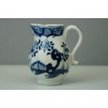 An 18th century blue and white sparrow beak jug.