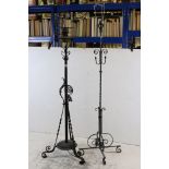 Two Wrought Iron Standard Oil Lamp converted to electric together with another Wrought Iron Standard