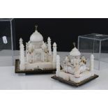 Two Alabaster Models of the Taj Mahal, cased, largest 15cms high