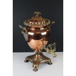 19th century Copper and Brass Vase Shaped Tea Urn with Ebony Covered Handles, 47cms high