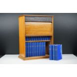 ' Miniature Library of the Poets ', 24 volumes circa 1880 with blue cloth bindings in a fitted oak