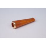 Amber cheroot holder with yellow metal mount