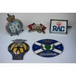 A collection of four vintage car badges / mascots to include AA & RAC together with a belt buckle.