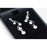 Pair of silver and CZ drop earrings