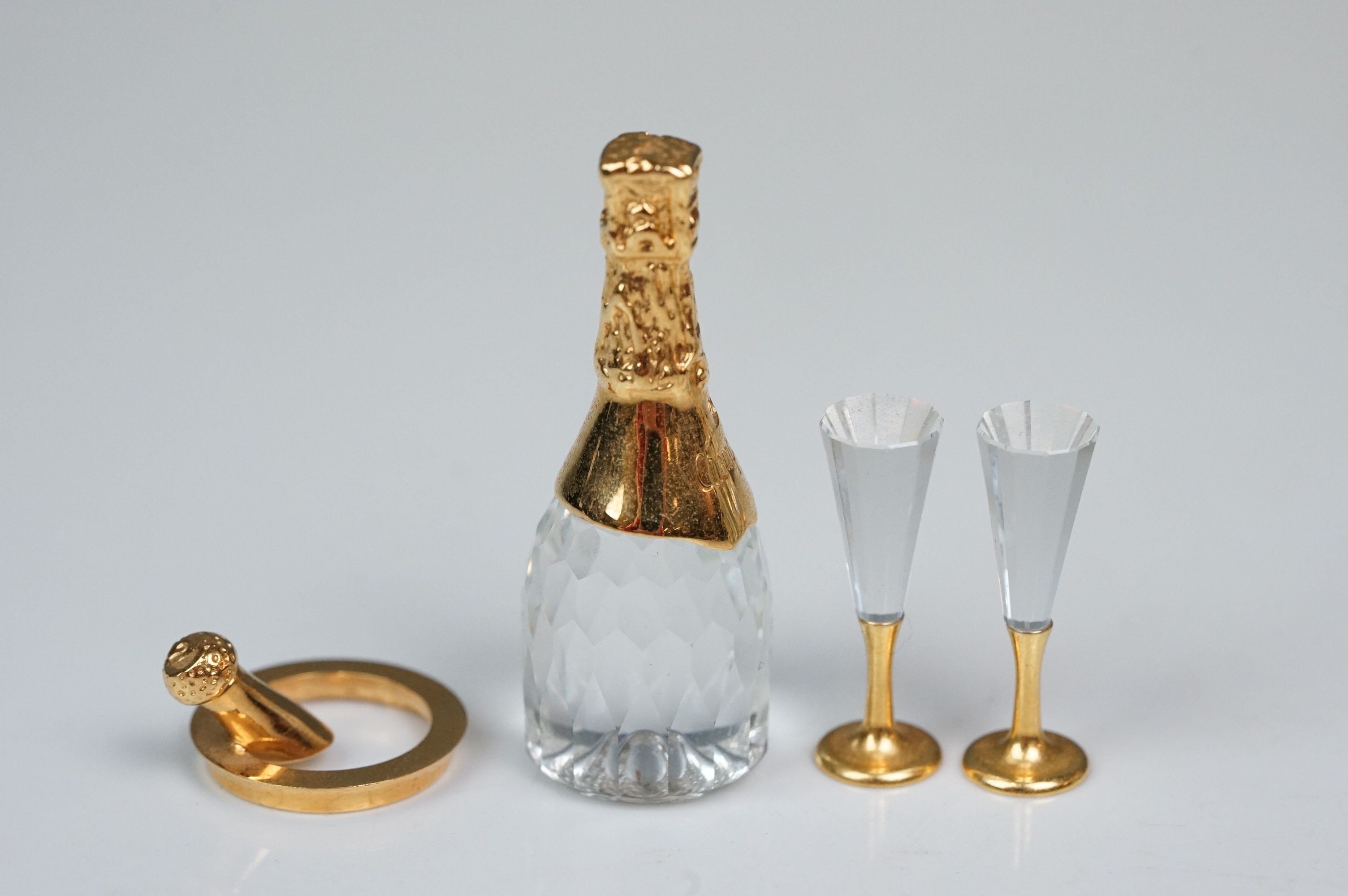 Nine Swarovski Crystal miniatures, comprising champagne bottle, two champagne flutes, teapot with - Image 3 of 5