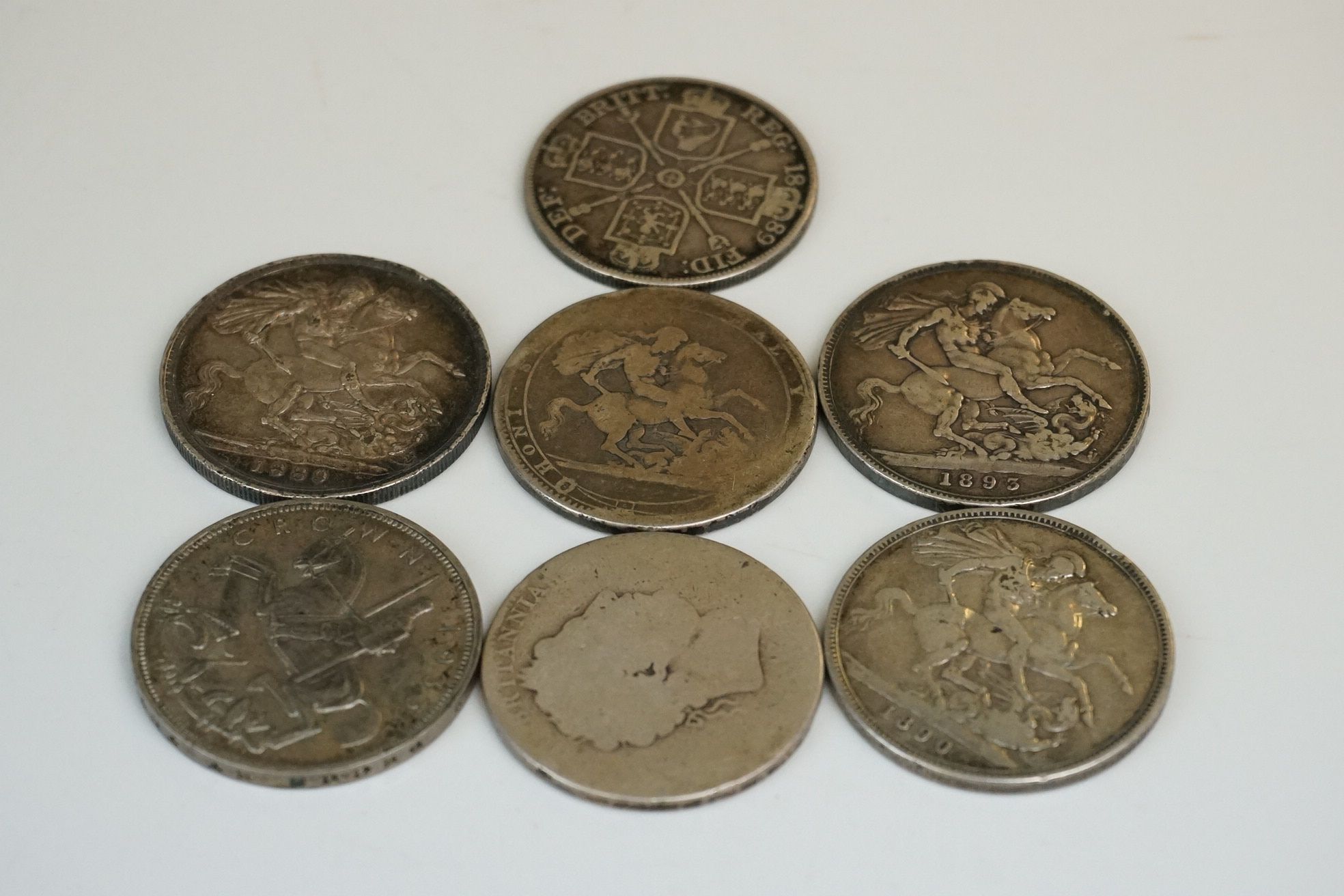 A collection of six silver crown coins to include Victorian examples together with a Victorian