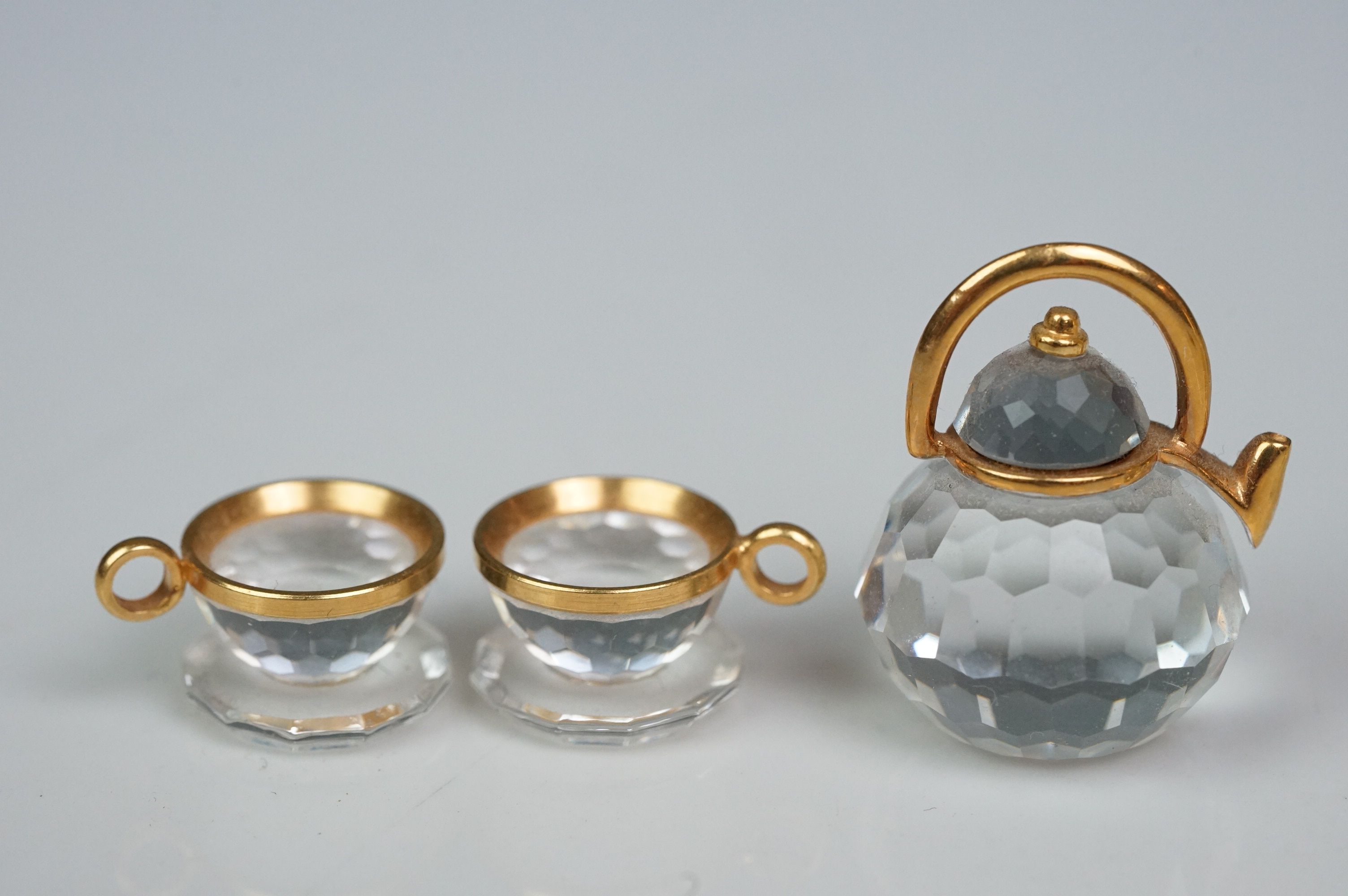 Nine Swarovski Crystal miniatures, comprising champagne bottle, two champagne flutes, teapot with - Image 2 of 5