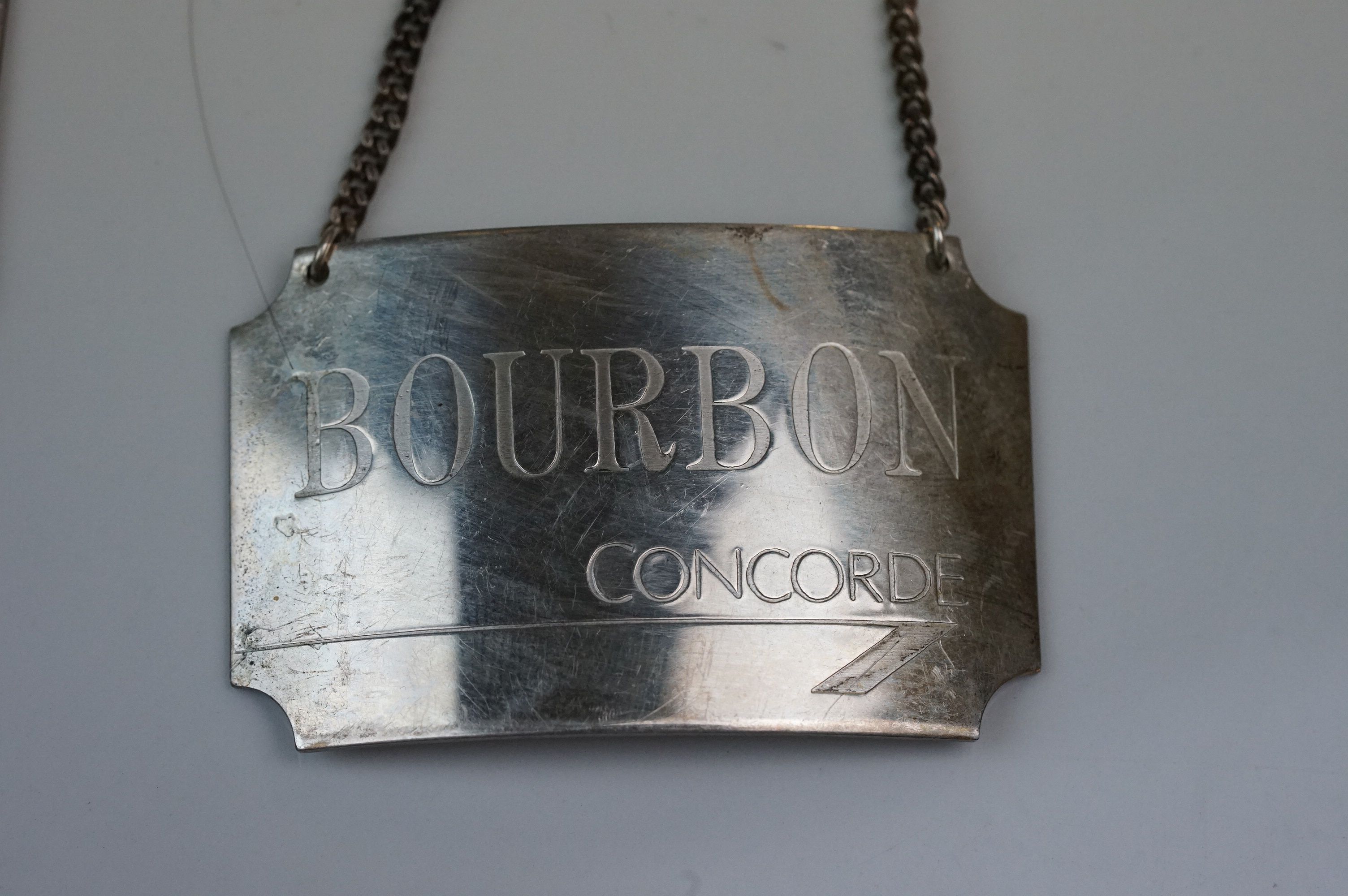 A set of four fully hallmarked sterling silver decanter labels, all engraved Concorde. - Image 4 of 8