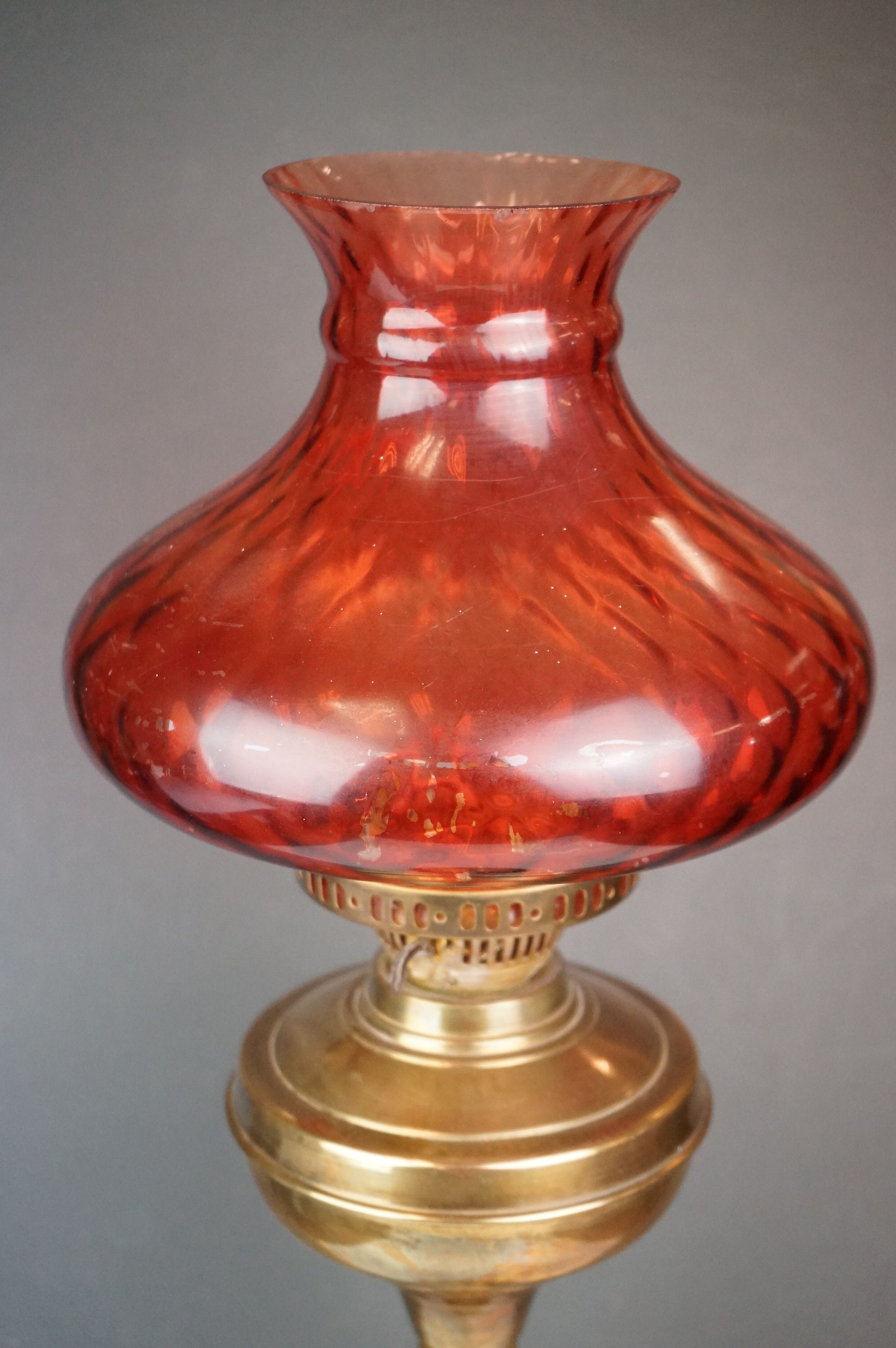 A vintage brass oil lamp with orange glass shade converted to electric. - Image 2 of 4