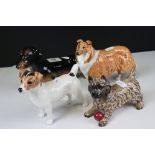 Four Beswick Dogs including Dachshund - standing (no. 361), Cairn Terrier with ball (no. 1055a),