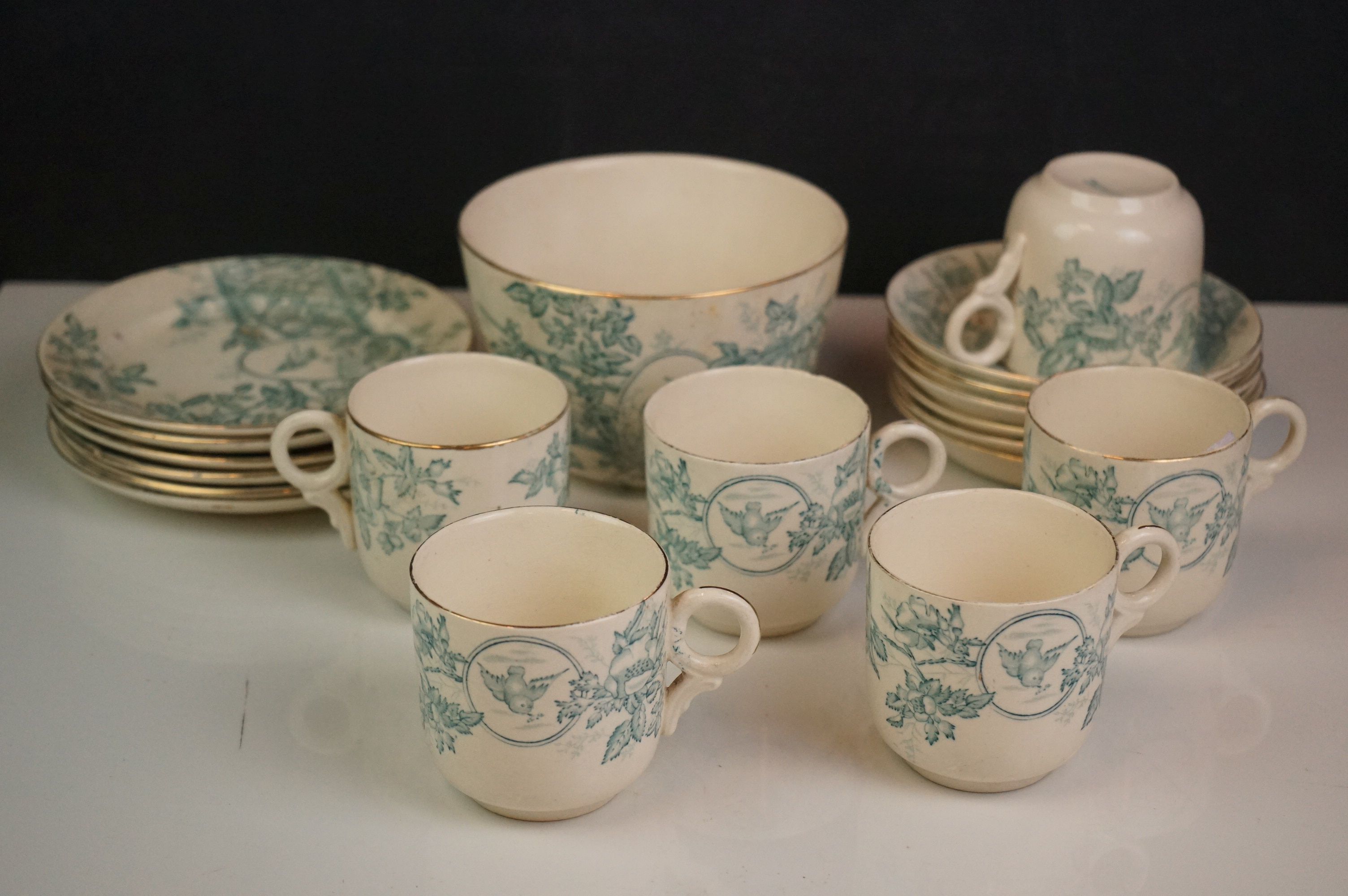 A collection of Victorian ceramics with bird and floral decoration, marked Adelaide to base along
