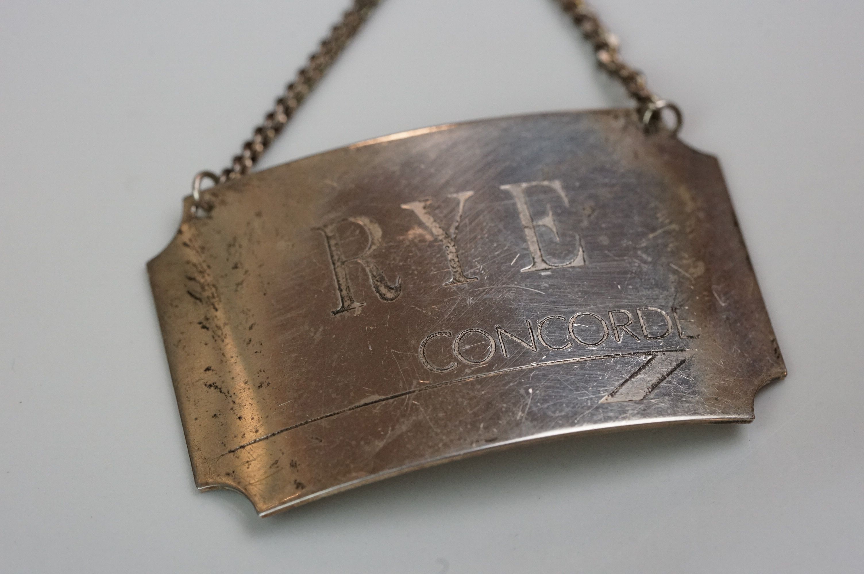 A set of four fully hallmarked sterling silver decanter labels, all engraved Concorde. - Image 5 of 8