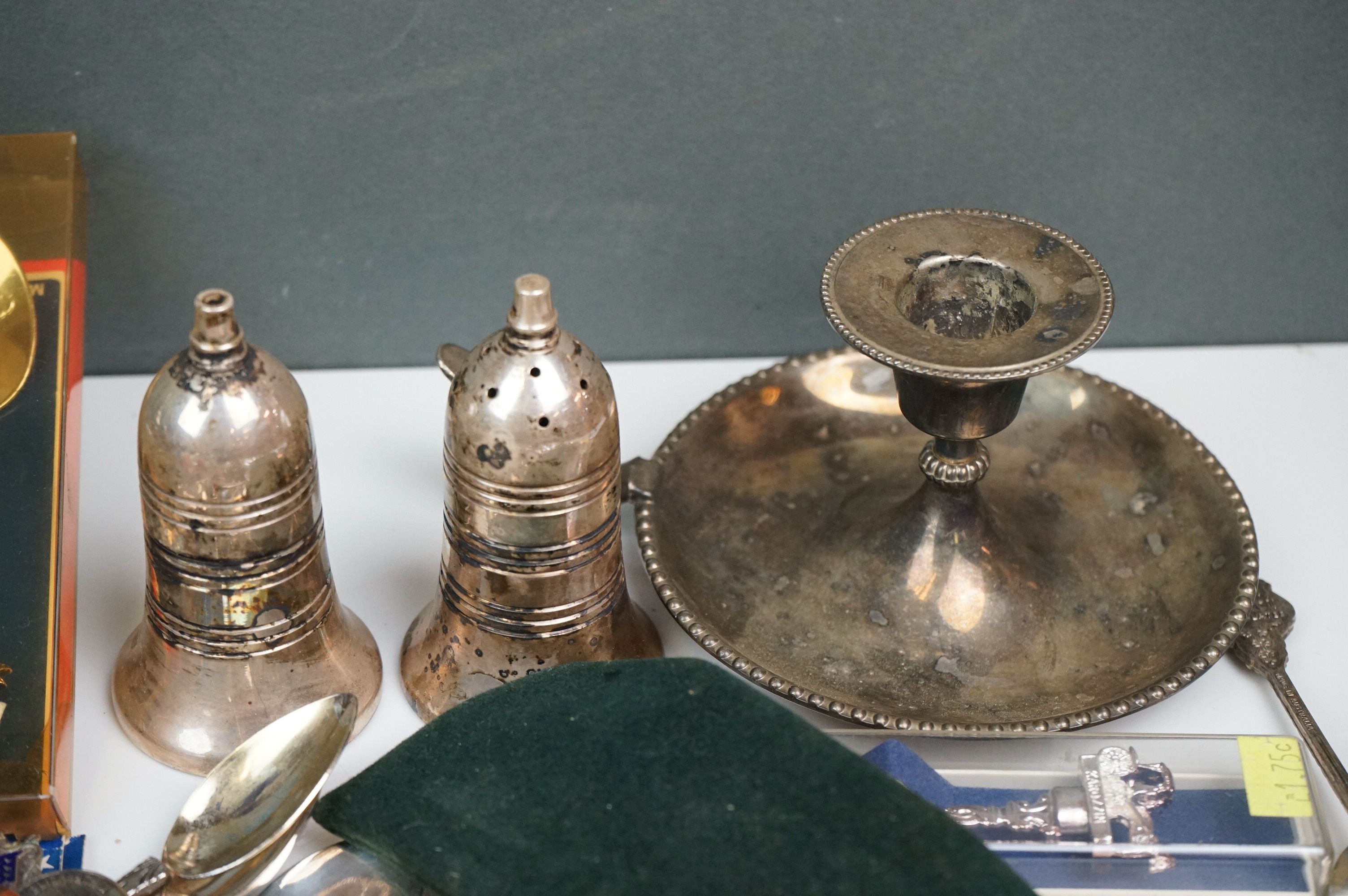 A mixed box of silver plated items to include collectors spoons, candle holder and sugar shaker. - Image 7 of 7