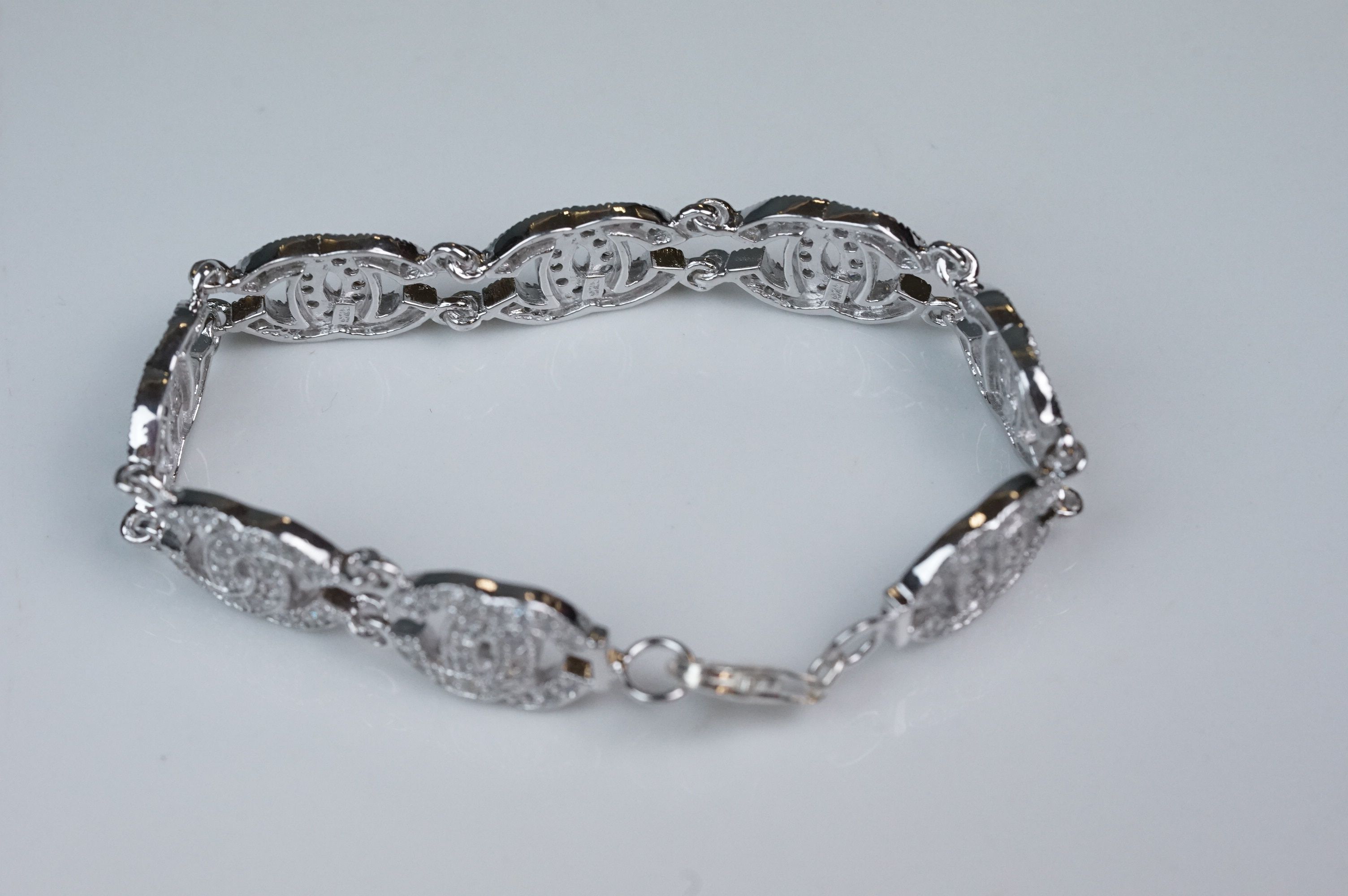 Silver and CZ set bracelet, in the Chanel style, set with eight double C links - Image 3 of 6