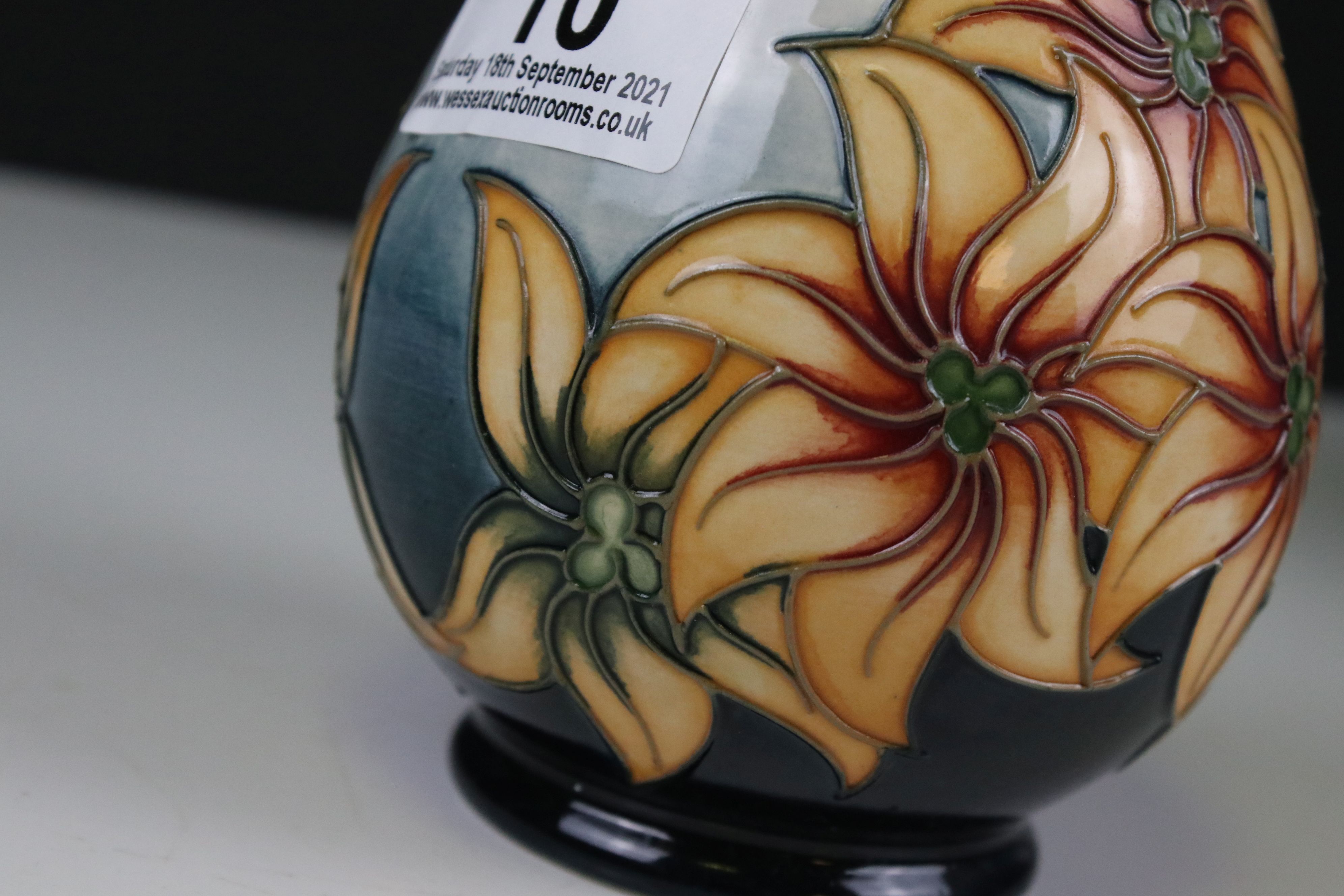 Moorcroft Vase decorated with Orange Flowers on a White and Teal ground., 14cms high, boxed - Image 5 of 5