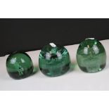 Three Victorian Green Glass Dump Paperweights, one with plaster bird insert and the other two with