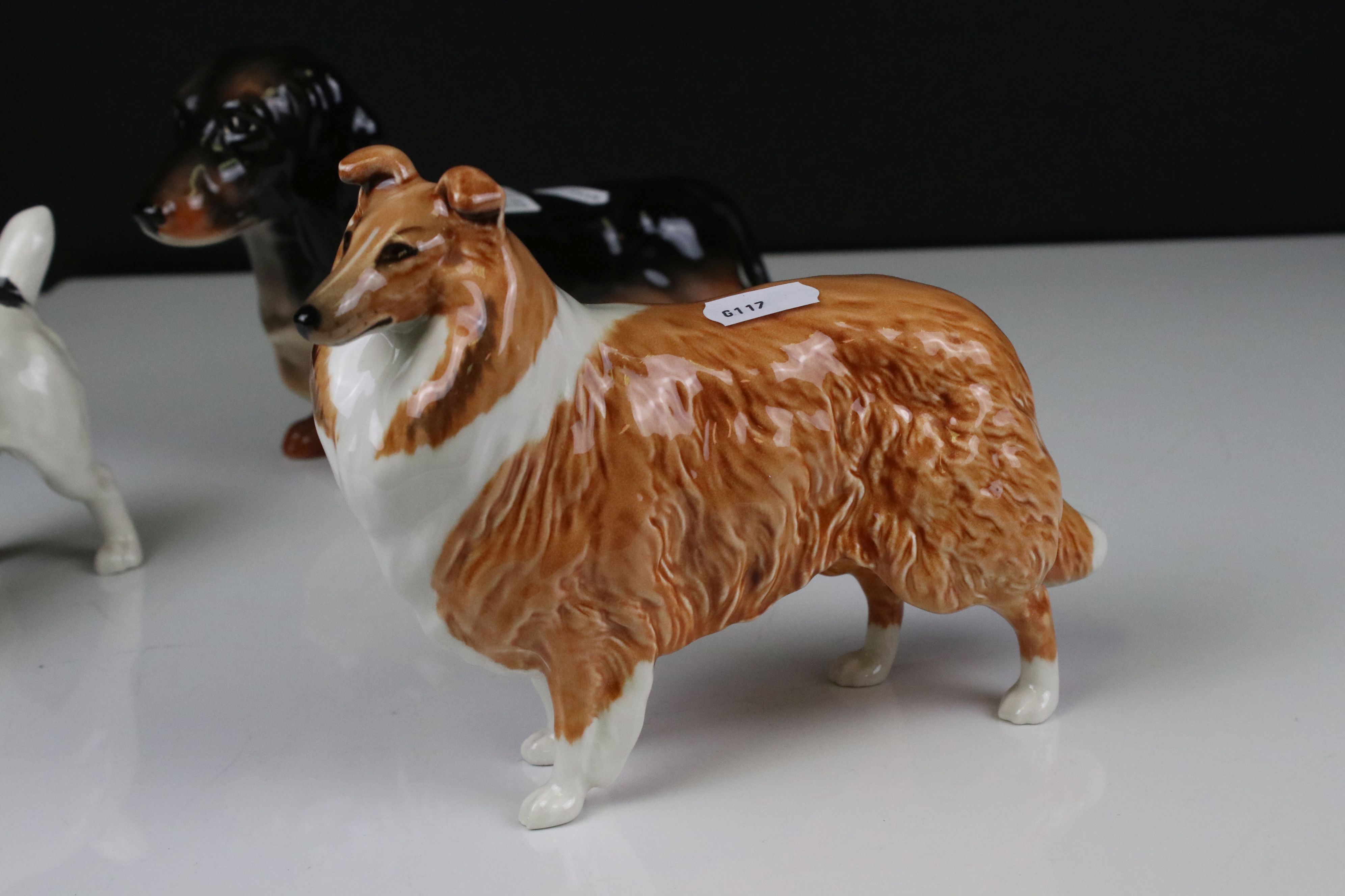 Four Beswick Dogs including Dachshund - standing (no. 361), Cairn Terrier with ball (no. 1055a), - Image 5 of 12