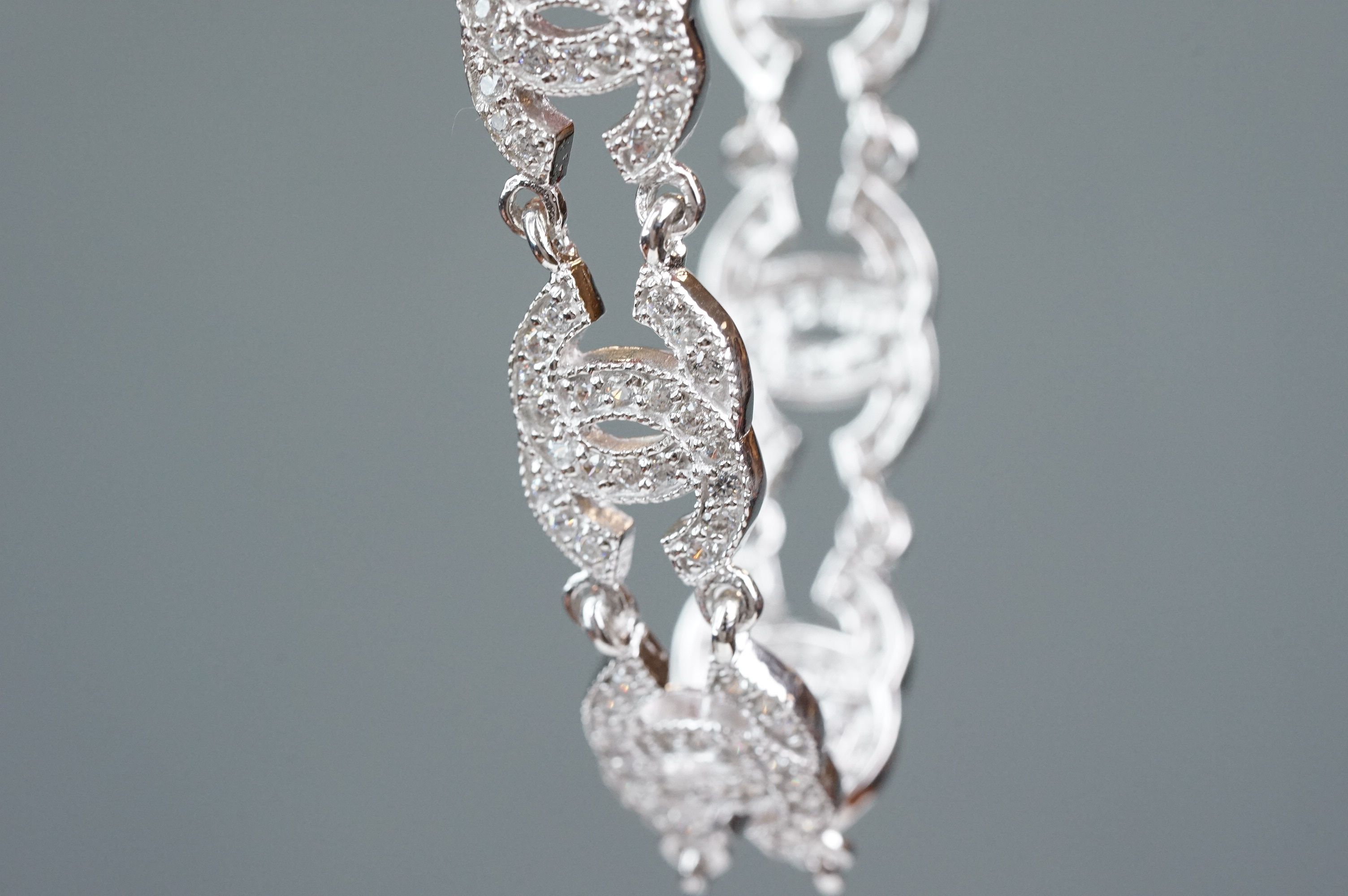 Silver and CZ set bracelet, in the Chanel style, set with eight double C links - Image 6 of 6