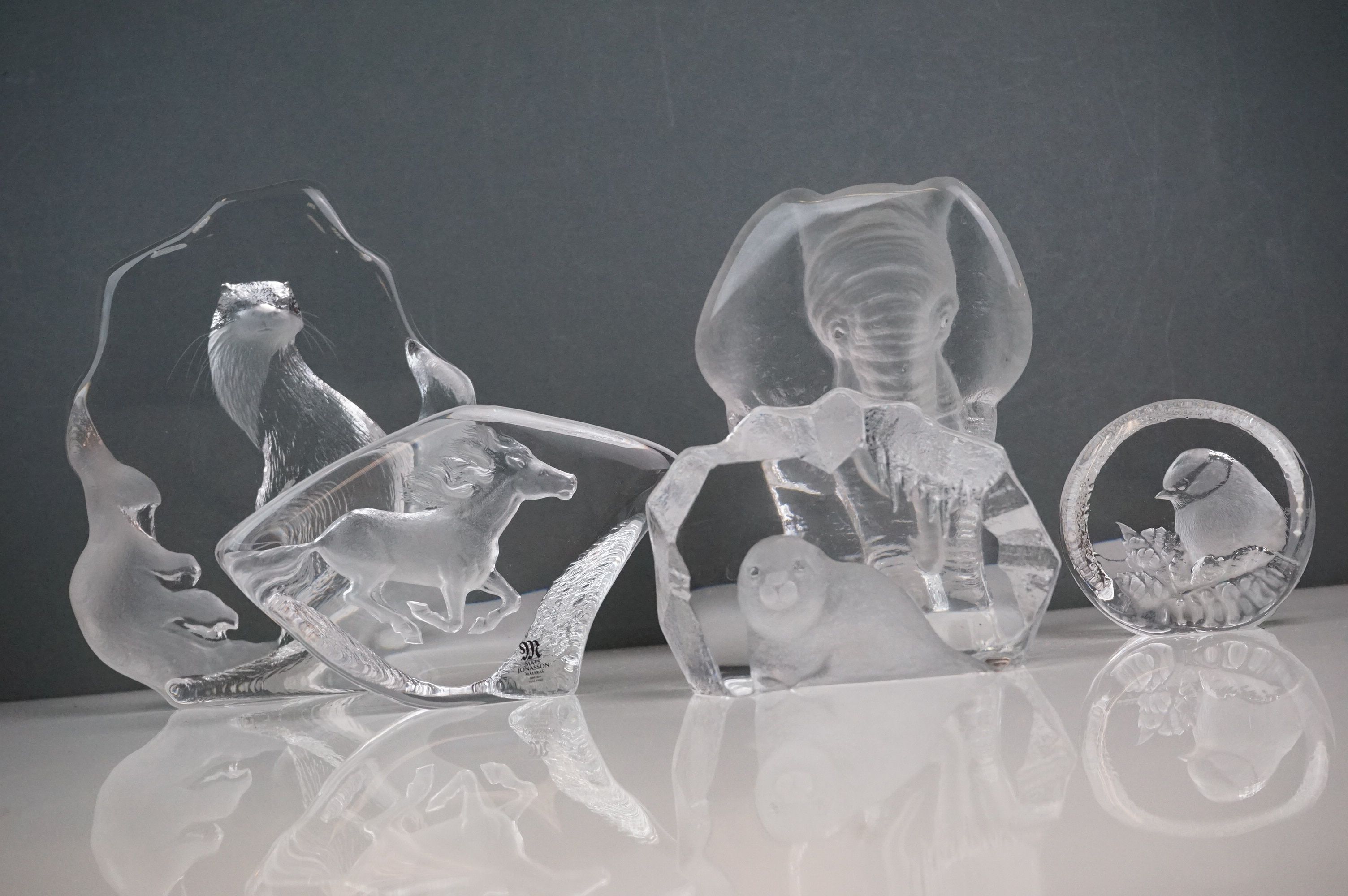 A collection of five glass animal sculptures to include a Mats Jonasson example.