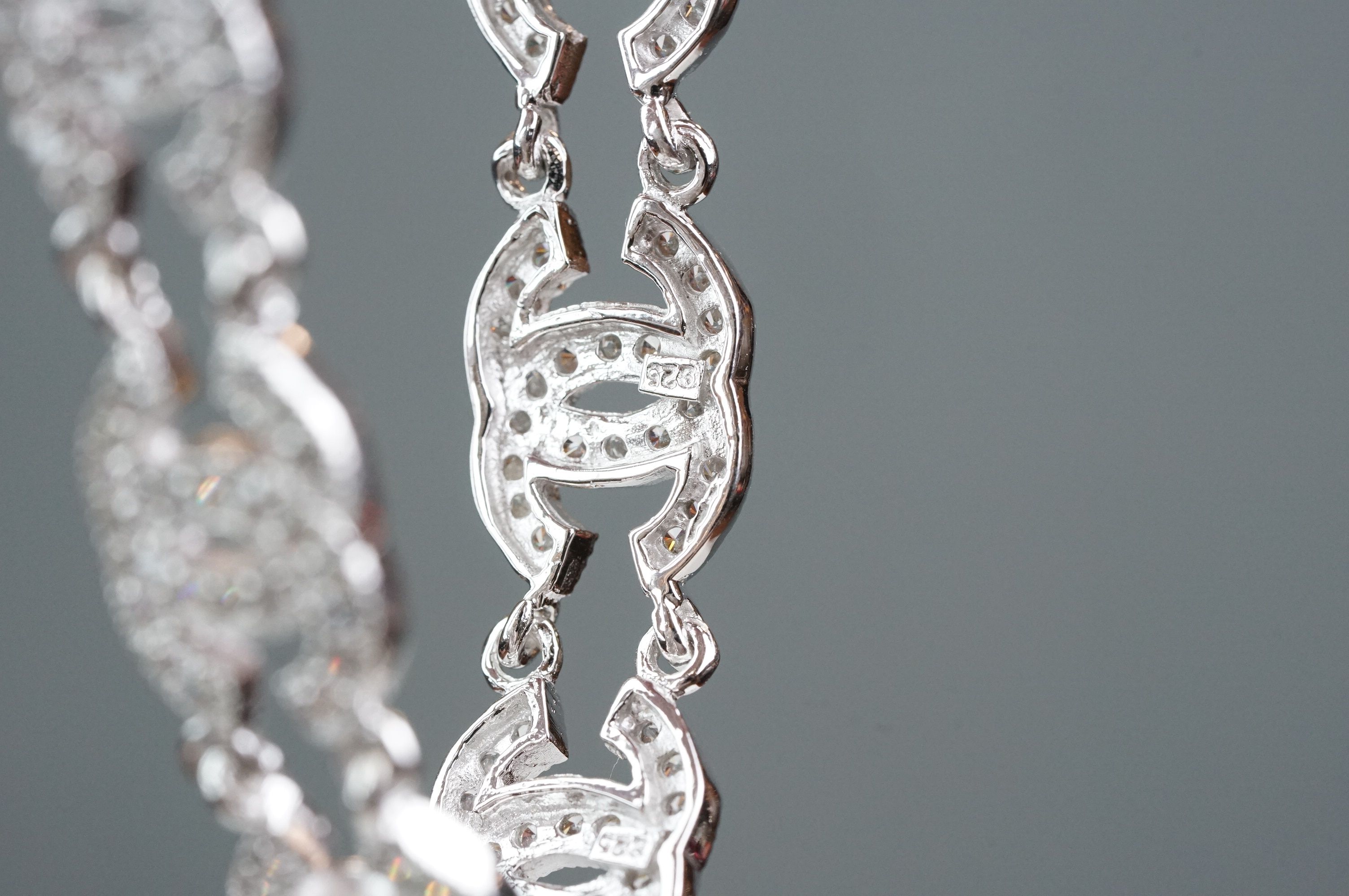 Silver and CZ set bracelet, in the Chanel style, set with eight double C links - Image 5 of 6