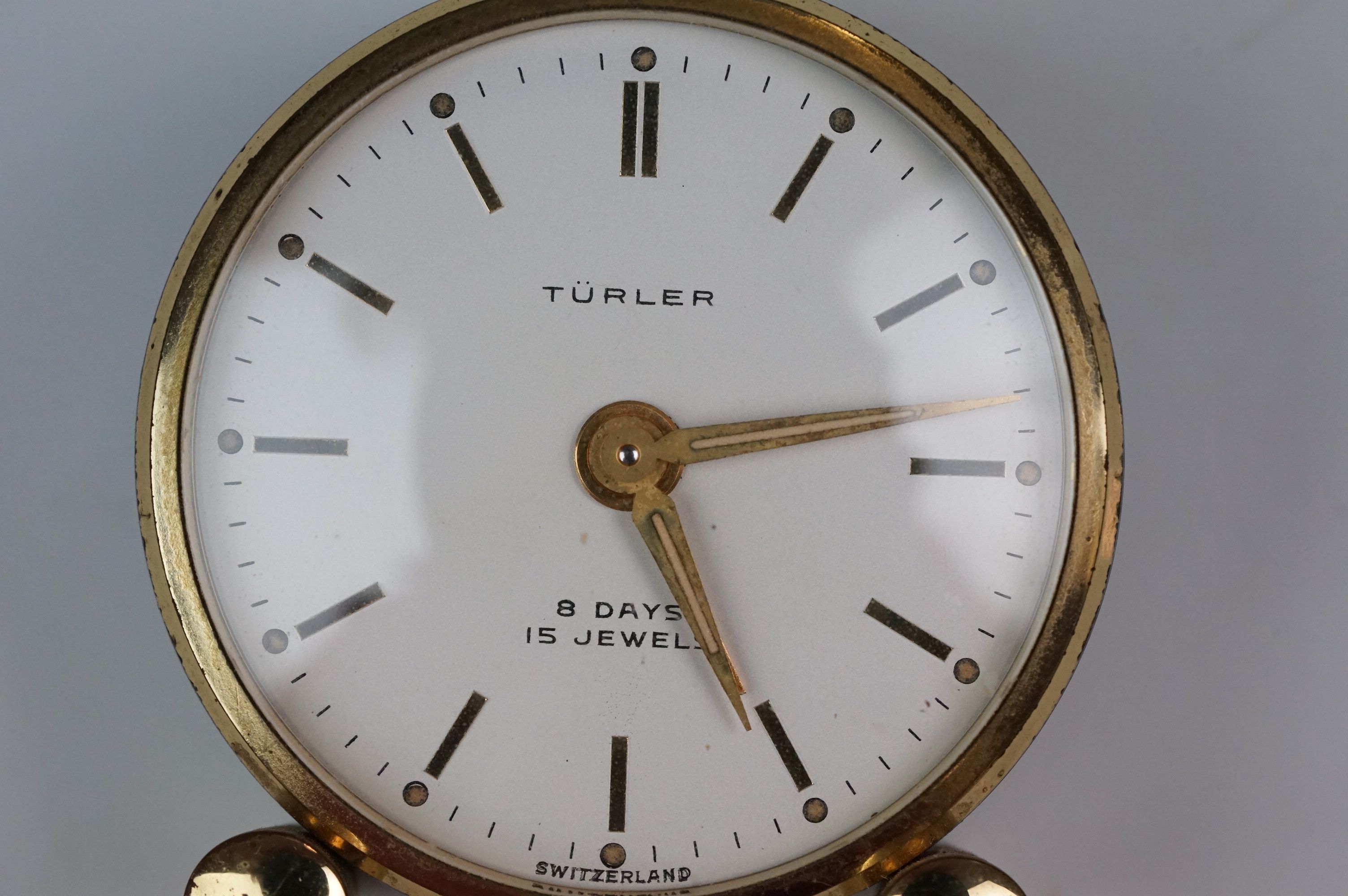 A vintage Art Deco Turler 8 day 15 jewel travel clock. - Image 6 of 6