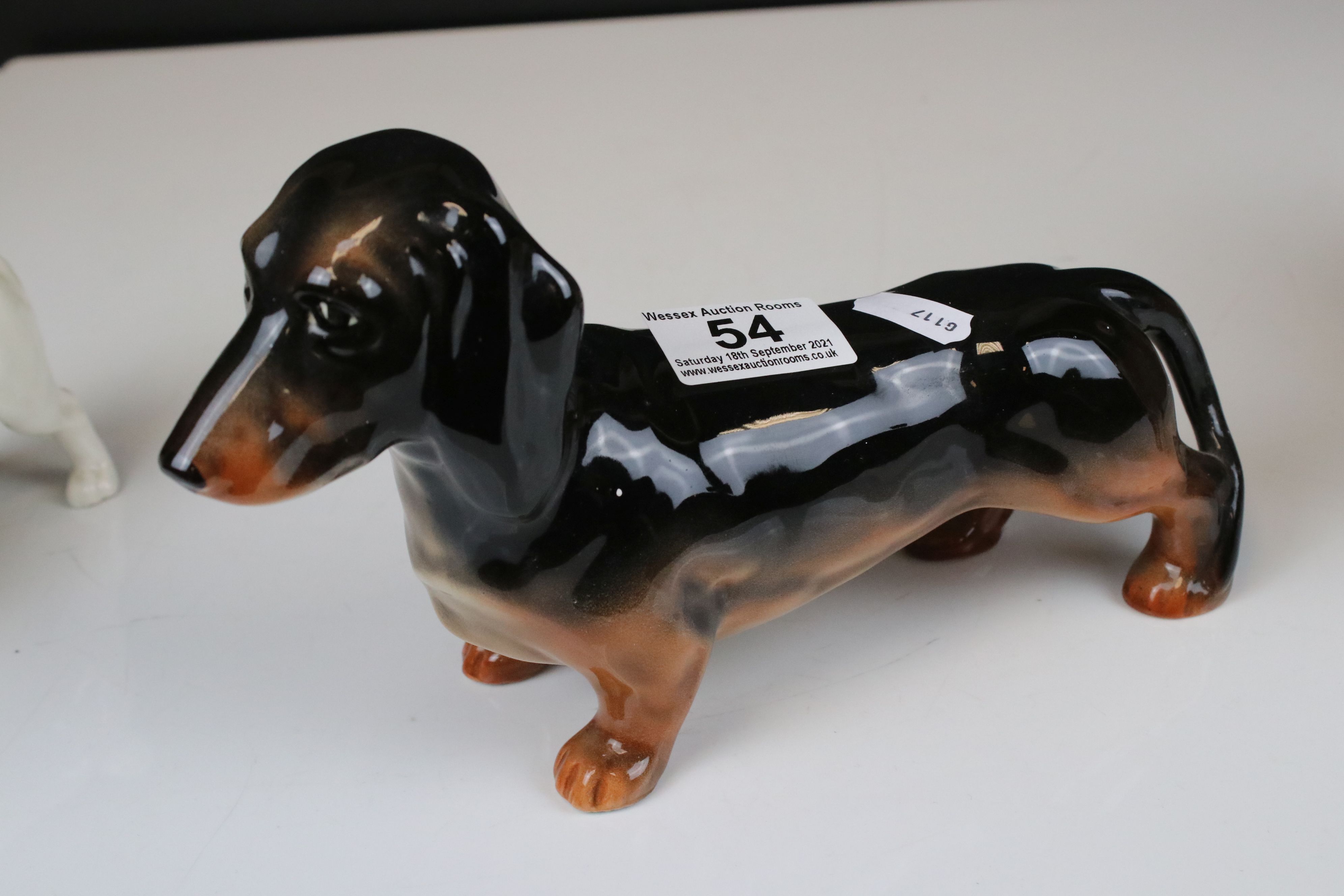 Four Beswick Dogs including Dachshund - standing (no. 361), Cairn Terrier with ball (no. 1055a), - Image 8 of 12