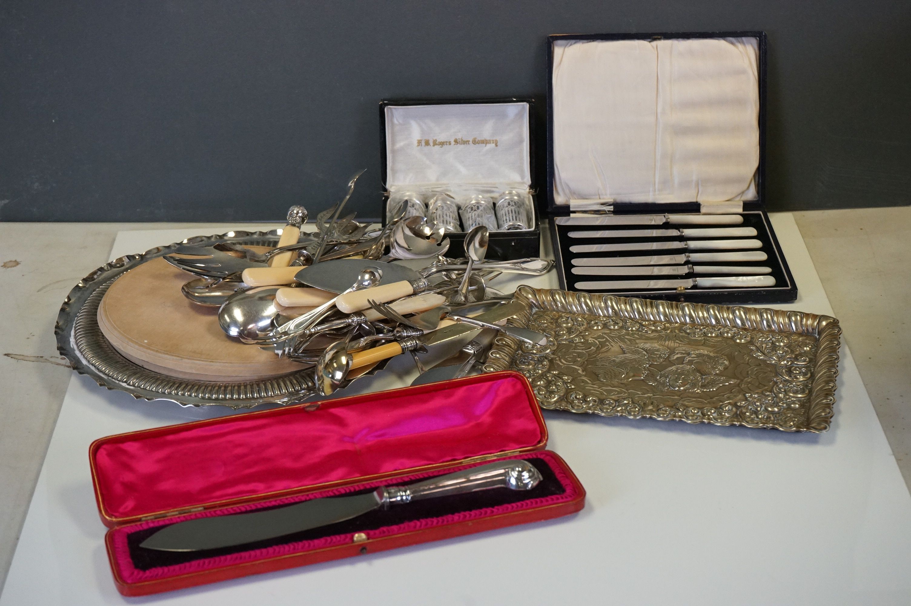 A collection of silver plated items to include cutlery, tray and a Reynolds Angles tray.