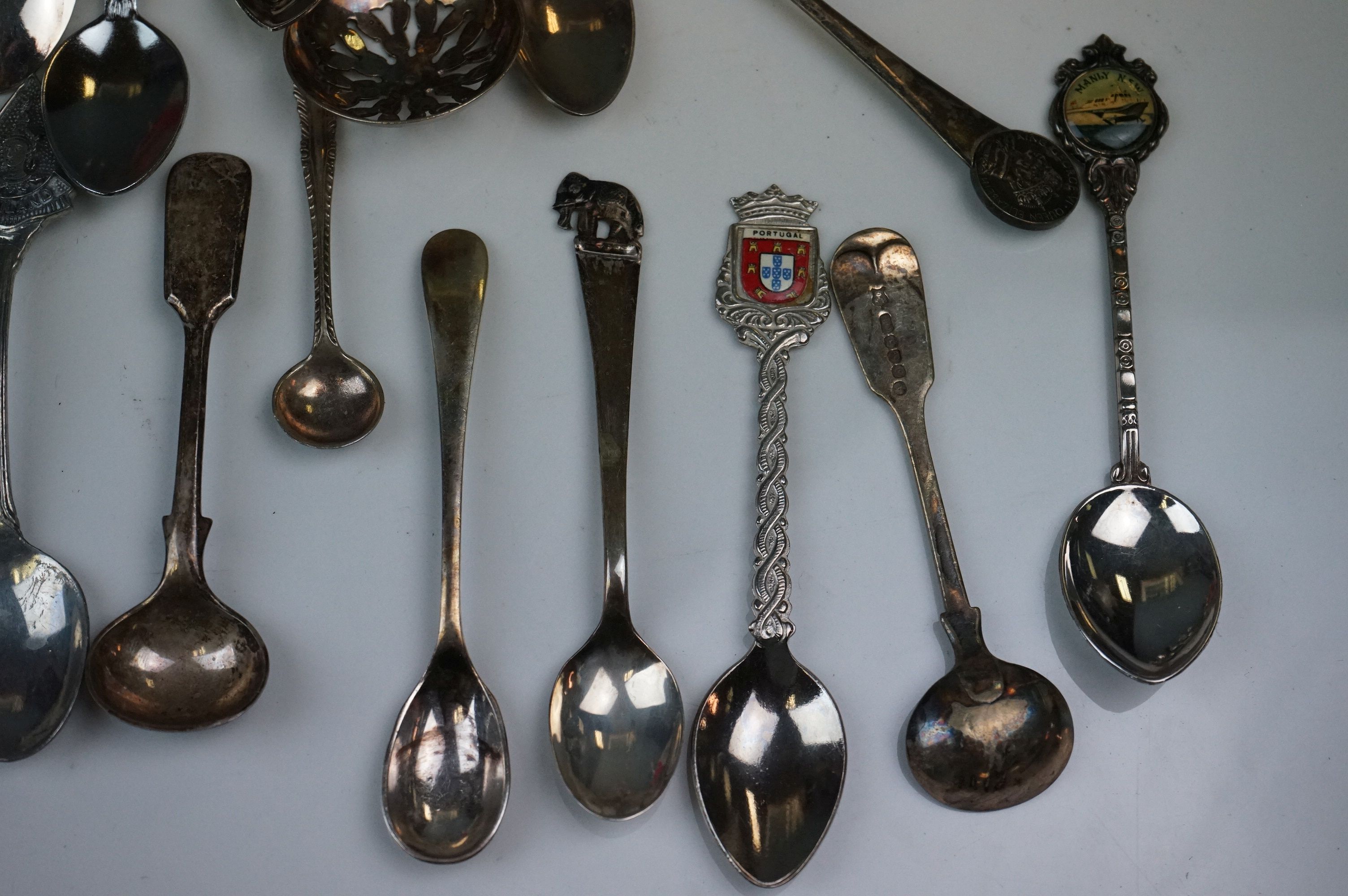 A mixed box of silver plated items to include collectors spoons, candle holder and sugar shaker. - Image 3 of 7