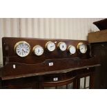 Mahogany Shelf holding Six Circular Brass Instruments including Clock, Three Tidal Indicators,