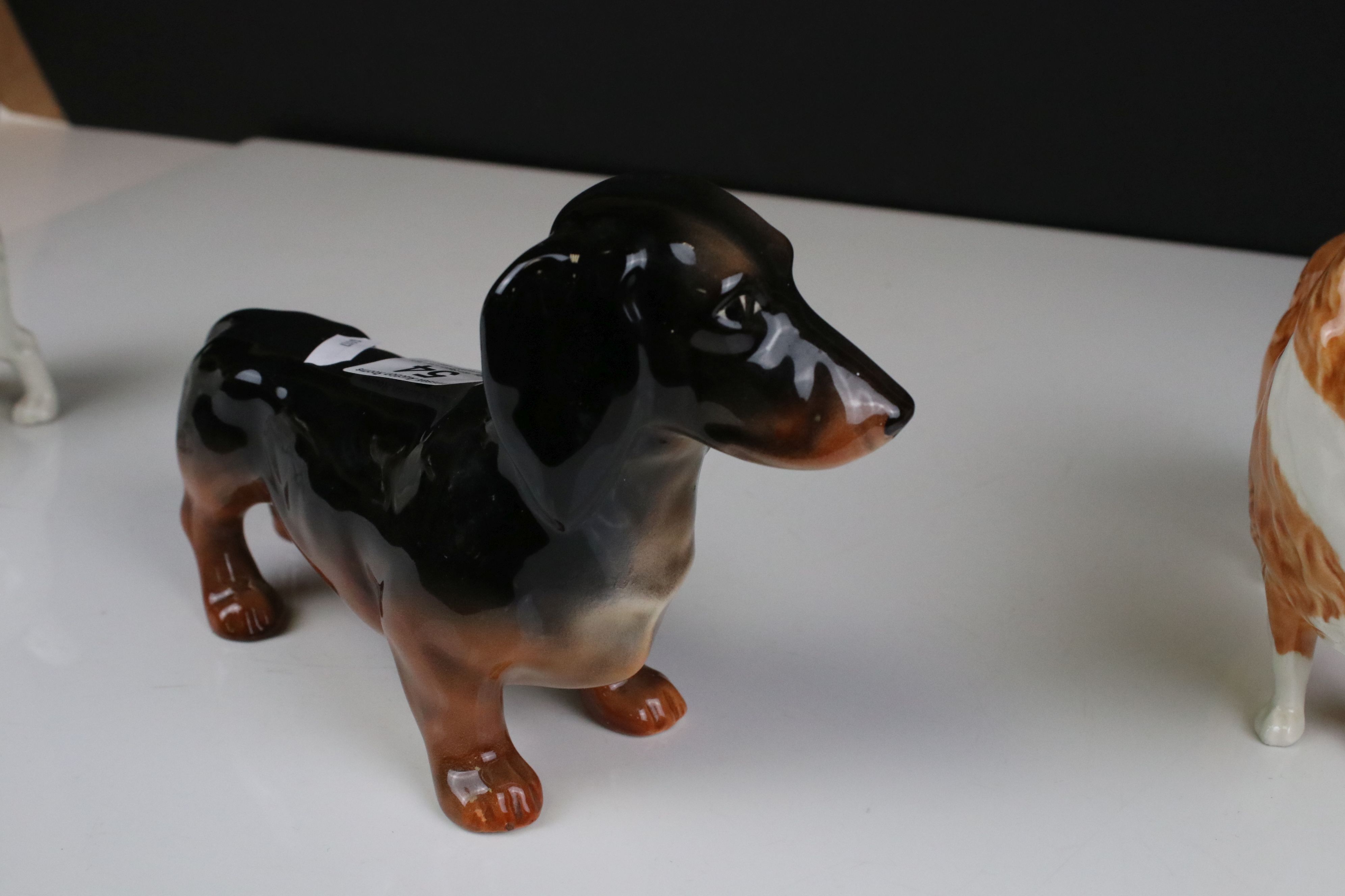 Four Beswick Dogs including Dachshund - standing (no. 361), Cairn Terrier with ball (no. 1055a), - Image 9 of 12